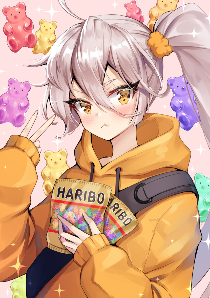 1girl ahoge ankkoyom bangs blush commentary copyright_name eating girls_frontline gummy_bear hair_between_eyes hair_ornament haribo highres holding hood hood_down long_hair looking_at_viewer orange_hoodie pkp_(girls_frontline) side_ponytail silver_hair sleeves_past_wrists solo very_long_hair yellow_eyes