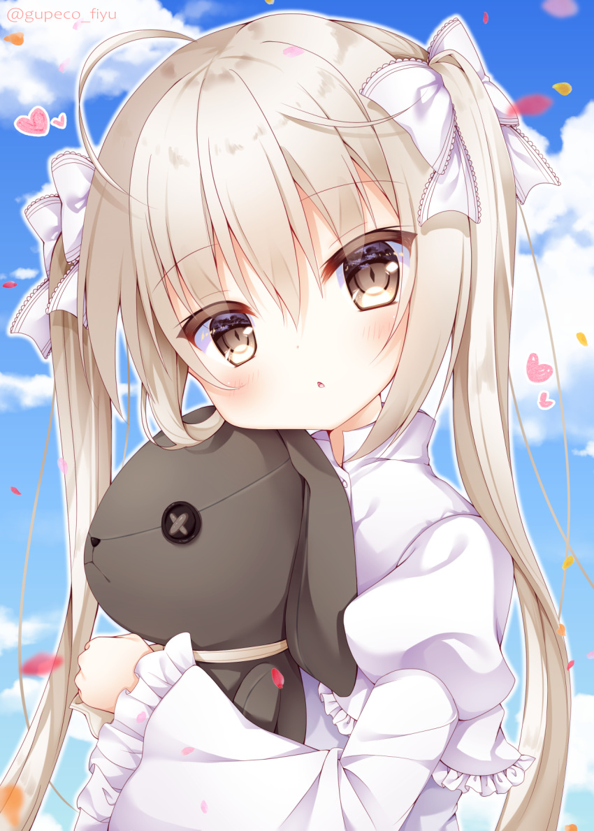 1girl ahoge blue_sky blush bow brown_eyes brown_hair cloud commentary_request day dress frilled_sleeves frills fuxiyu hair_bow head_tilt heart highres juliet_sleeves kasugano_sora long_hair long_sleeves looking_at_viewer object_hug outdoors parted_lips petals puffy_sleeves sky sleeves_past_wrists solo stuffed_animal stuffed_bunny stuffed_toy twintails twitter_username upper_body very_long_hair white_bow white_dress yosuga_no_sora