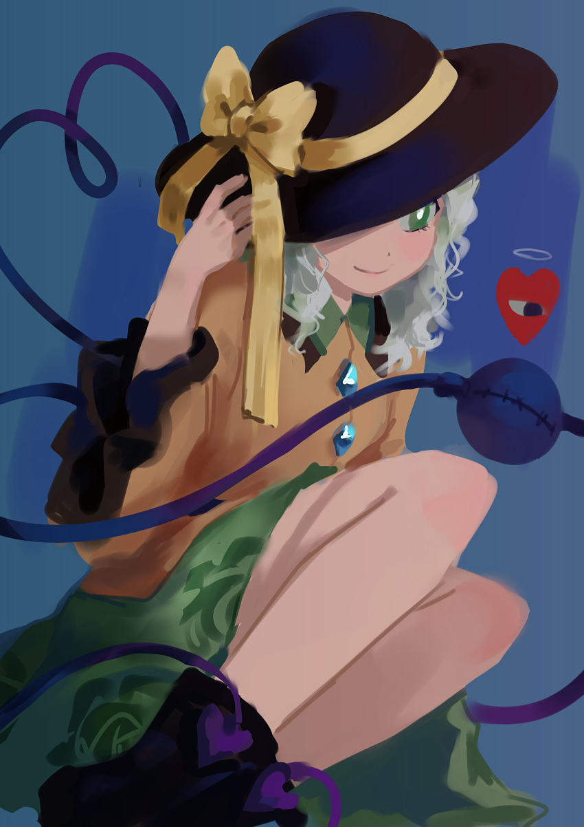 1girl absurdres bare_legs black_headwear black_socks blue_background blue_gemstone bow bright_pupils closed_mouth curly_hair diamond_(shape) dot_nose floral_print gem green_eyes green_skirt grey_hair halo hand_up hat hat_bow hat_over_one_eye heart heart_of_string highres himuhino knees_up komeiji_koishi light_blush orange_shirt rose_print shirt sitting skirt smile socks solo stitched_eye third_eye touhou white_pupils wide_sleeves yellow_bow