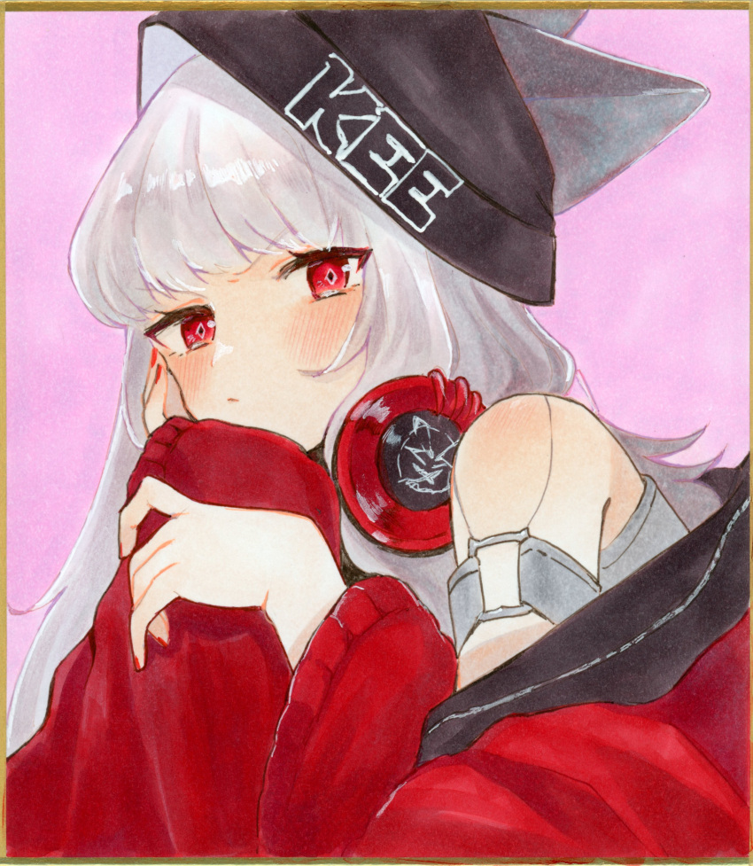 1girl absurdres animal_ears arknights bare_shoulders beanie black_beanie blush chanoko_(hytnmjtns) clothes_writing commentary_request diamond-shaped_pupils diamond_(shape) ears_through_headwear frostleaf_(arknights) gold_border grey_hair grey_shirt hand_on_own_cheek hand_on_own_face hat headphones headphones_around_neck highres jacket long_hair long_sleeves marker_(medium) nail_polish off_shoulder pink_background red_eyes red_jacket red_nails shikishi shirt solo symbol-shaped_pupils traditional_media upper_body