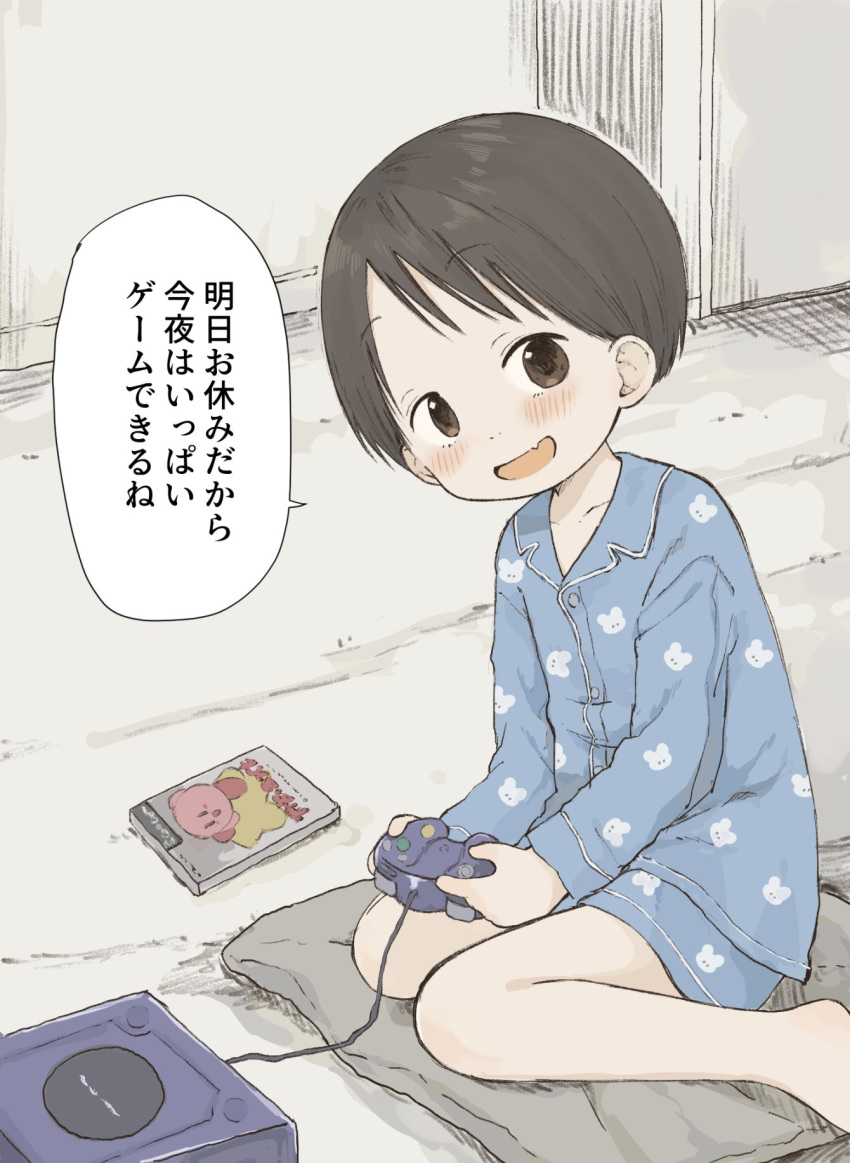 1girl :d bare_legs barefoot black_hair blue_pajamas blue_shirt blue_shorts blush brown_eyes buttons collarbone collared_shirt commentary_request controller fang game_console game_controller gamecube gamecube_controller highres ichigo_mashimaro indoors itou_chika kirby_(series) long_sleeves looking_at_viewer nanoningen_(anapoko) on_pillow open_mouth pajamas pillow print_pajamas shirt short_hair short_shorts shorts sitting skin_fang smile solo translation_request wariza