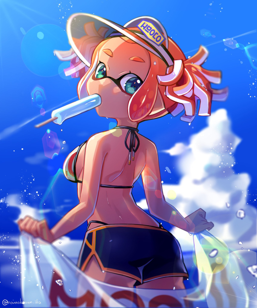 1girl back beach_towel bikini bikini_shorts black_shorts blue_sky blurry blurry_background breasts cloud cloudy_sky commentary cowboy_shot day depth_of_field domino_mask droplet food from_behind green_eyes highres holding holding_towel inkling inkling_(language) lens lens_flare logo looking_at_viewer looking_back mask medium_breasts mouth_hold nou orange_hair outdoors pointy_ears popsicle red_bikini see-through short_twintails shorts sky solo splatoon_(series) standing string_bikini sweatdrop swimsuit tentacle_hair towel twintails visor_cap