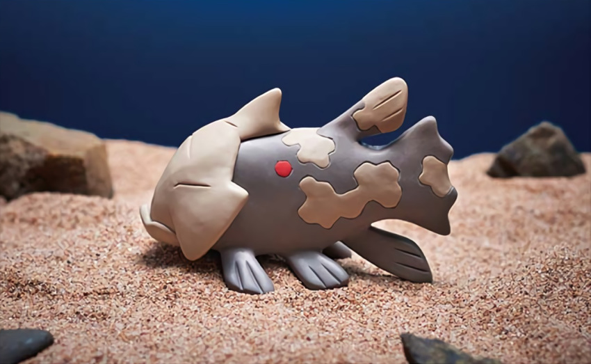 closed_eyes closed_mouth creature fish from_side full_body gen_3_pokemon morii_yuka no_humans official_art photo pokemon pokemon_(creature) pokemon_trading_card_game profile relicanth rock sand solo third-party_source