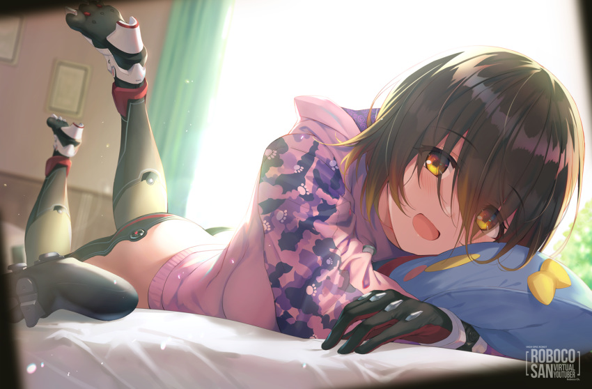 1girl :d backlighting brown_hair commentary_request controller curtains cushion eyebrows_visible_through_hair fukai_ryousuke game_controller gamepad gloves high_heels hood hoodie indoors looking_at_viewer lying on_stomach open_mouth roboco-san roboco_ch. smile solo virtual_youtuber yellow_eyes