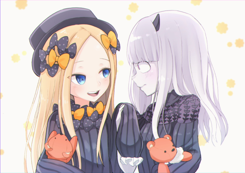 2girls abigail_williams_(fate/grand_order) bangs black_bow black_headwear blonde_hair blue_eyes blush bow commentary_request dress fate/grand_order fate_(series) hair_bow hat lavinia_whateley_(fate/grand_order) long_hair long_sleeves looking_at_viewer multiple_girls object_hug orange_bow parted_bangs polka_dot polka_dot_bow sato_(r017xts117) sleeves_past_fingers sleeves_past_wrists stuffed_animal stuffed_toy teddy_bear very_long_hair