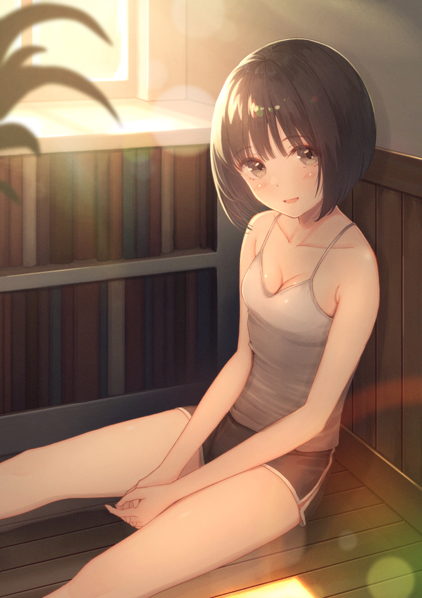 1girl bangs bare_shoulders between_legs black_hair black_shorts blunt_bangs bob_cut book bookshelf breasts brown_eyes camisole cleavage collarbone hand_between_legs hands_clasped hands_together highres lens_flare light_blush looking_at_viewer open_mouth original own_hands_together plant short_hair short_shorts shorts sitting_on_floor small_breasts smile solo spaghetti_strap sunset tanbonota46 wainscoting white_camisole window wooden_floor