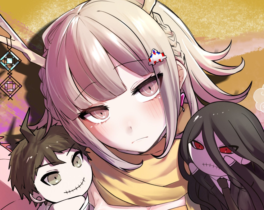 1girl antler_ornament antlers blush braid brown_hair character_doll danganronpa_(series) danganronpa_2:_goodbye_despair earrings frown galaga hair_ornament heart heart_earrings highres hinata_hajime holding horns jewelry looking_at_viewer medium_hair nanami_chiaki orange_background orange_scarf pink_eyes scarf smile solo zui_nianshao