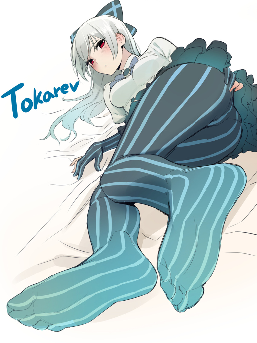 1girl blush bow breasts character_name dress feet girls_frontline gloves hair_bow highres hyury long_hair looking_at_viewer lying no_shoes pantyhose parted_lips partly_fingerless_gloves red_eyes silver_hair simple_background solo striped striped_gloves striped_legwear tokarev_(girls_frontline) white_background white_dress