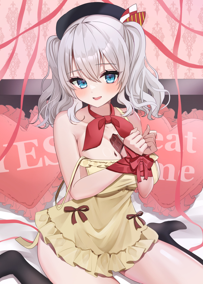 1girl absurdres apron bed beret between_breasts black_headwear black_socks blue_eyes blush bound bound_wrists breasts chocolate cleavage frilled_apron frills hair_between_eyes hat heart highres kantai_collection kashima_(kancolle) large_breasts long_hair looking_at_viewer on_bed open_mouth red_ribbon ribbon sitting socks solo twintails wavy_hair yellow_apron yes yes-no_pillow yoshino_(mfmfpng)