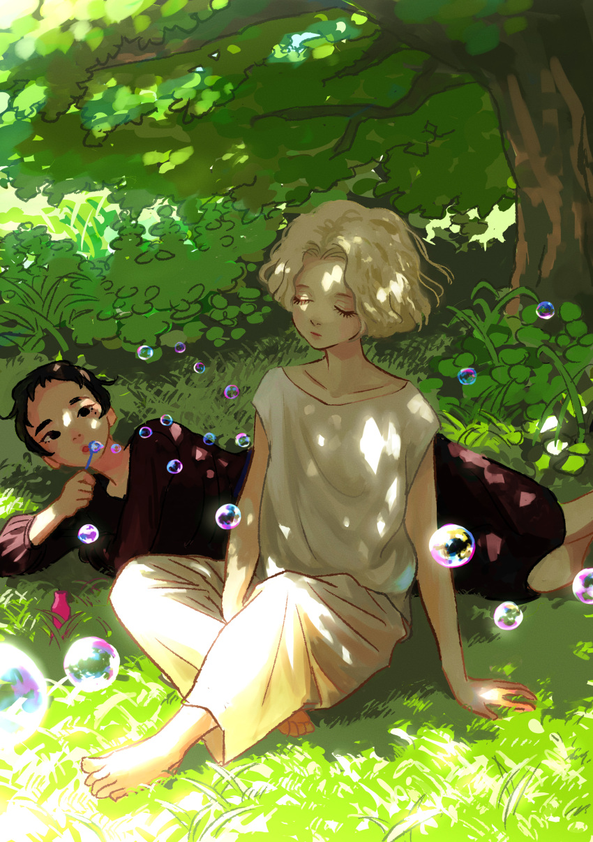 2girls absurdres arm_support barefoot black_dress black_hair blonde_hair bubble bubble_blowing bubble_wand closed_eyes closed_mouth dappled_sunlight day dress eyelashes flower grass hand_on_ground highres long_sleeves looking_at_another lying mole mole_under_eye multiple_girls nature nemui_usio on_side original outdoors pants parted_bangs shirt short_hair sitting sunlight tree very_short_hair wavy_hair white_pants white_shirt