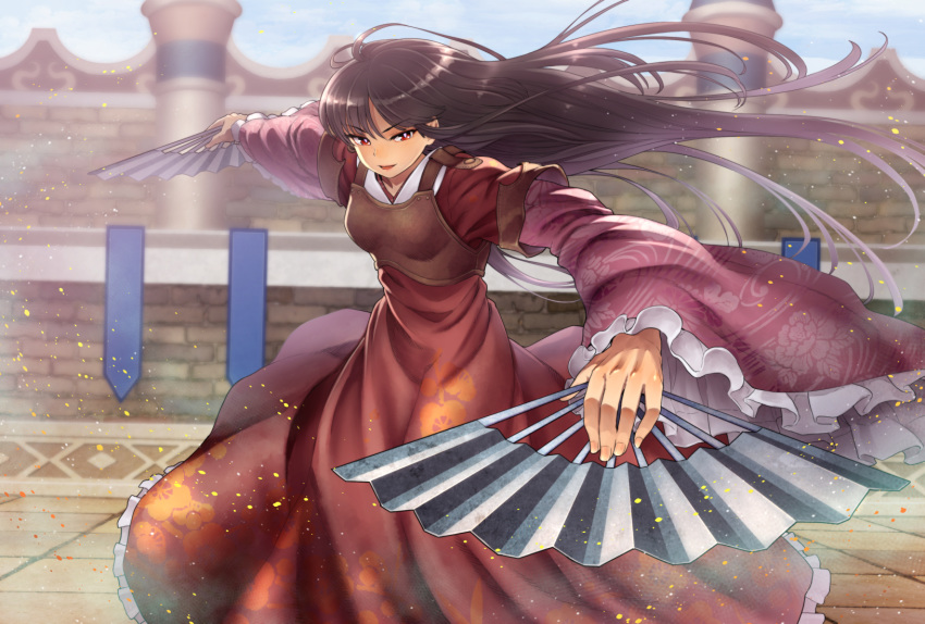 1girl armor black_hair blurry blurry_background chiaki_rakutarou dual_wielding fan frilled_sleeves frills highres holding houraisan_kaguya long_hair outdoors red_eyes solo tessen touhou war_fan wide_sleeves