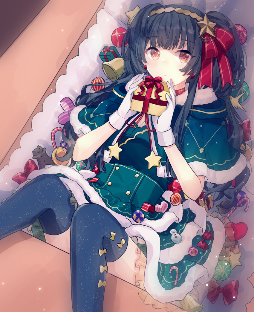 1girl bell black_hair black_legwear box brown_eyes dress earrings eyebrows_visible_through_hair fur-trimmed_dress fur_trim gift gloves gocoli green_dress hair_ornament headband highres holding holding_gift idolmaster idolmaster_shiny_colors in_box in_container jewelry long_hair lying mayuzumi_fuyuko on_back red_ribbon ribbon solo thighhighs two_side_up white_gloves