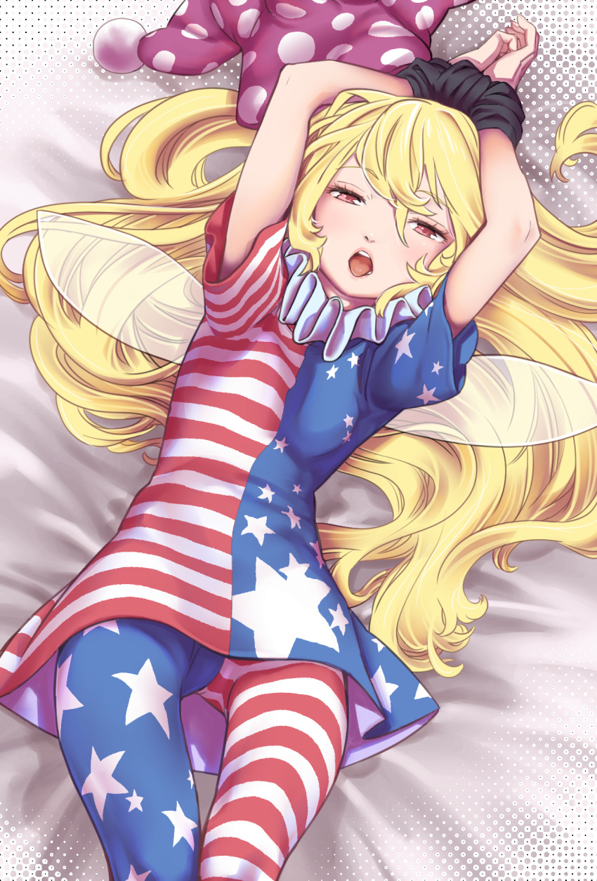 1girl american_flag_dress american_flag_legwear arms_up bed_sheet blonde_hair bound bound_wrists clownpiece fairy_wings half-closed_eyes hat headwear_removed highres jester_cap kawayabug long_hair neck_ruff on_bed open_mouth polka_dot_headwear red_eyes touhou upskirt wings