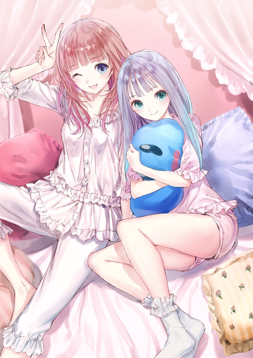 2girls atelier_(series) atelier_lulua bangs blue_eyes blunt_bangs brown_hair commentary_request elmerulia_fryxell green_eyes grey_hair highres kishida_mel long_hair looking_at_viewer mother's_day mother_and_daughter multiple_girls on_bed one_eye_closed pajamas pillow puni_(atelier) rororina_fryxell short_shorts short_sleeves shorts socks stuffed_animal stuffed_toy v white_legwear