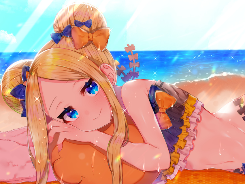 1girl abigail_williams_(fate/grand_order) akirannu bangs bare_shoulders beach bikini black_bikini black_bow blonde_hair blue_eyes blue_sky blush bow breasts closed_mouth double_bun emerald_float fate/grand_order fate_(series) forehead frilled_bikini frills long_hair looking_at_viewer lying multiple_bows navel ocean on_stomach orange_bow parted_bangs sidelocks sky small_breasts smile sparkle swimsuit wet