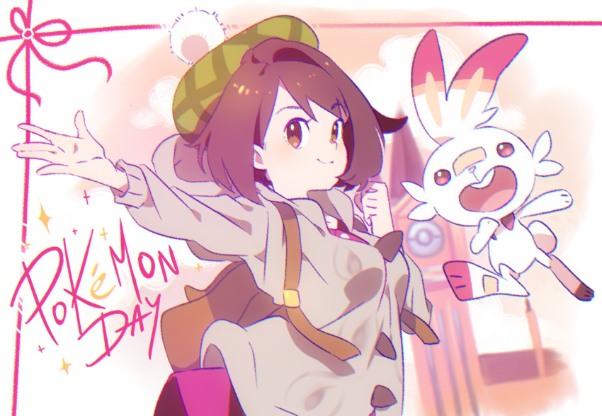1girl backpack bag bangs breasts brown_backpack brown_eyes brown_hair cardigan clenched_hand closed_mouth commentary_request copyright_name dress gen_8_pokemon goku-chan green_headwear grey_cardigan hands_up highres pink_dress pokemon pokemon_(creature) pokemon_(game) pokemon_swsh scorbunny smile tam_o'_shanter yuuri_(pokemon)