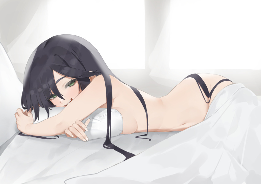 1girl black_hair blanket breasts flasso from_side genshin_impact green_eyes hair_between_eyes long_hair looking_at_viewer lying medium_breasts mona_(genshin_impact) navel pill smile solo teeth upper_teeth_only very_long_hair