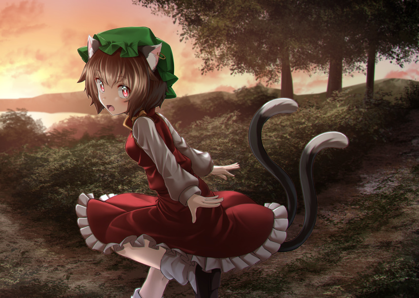 1girl :o animal_ear_fluff animal_ears arms_behind_back black_footwear bob_cut breasts bright_pupils brown_hair cat_ears cat_tail chen cloud cloudy_sky commentary eyebrows_visible_through_hair fang folded_leg foot_out_of_frame green_headwear hat highres jewelry kakutasu_(akihiron_cactus) lake leg_lift long_sleeves looking_at_viewer mob_cap mountain multiple_tails open_mouth outdoors petticoat red_eyes red_skirt red_vest shirt short_hair single_earring skirt sky small_breasts solo standing standing_on_one_leg tail touhou tree twilight vest white_legwear white_pupils white_shirt