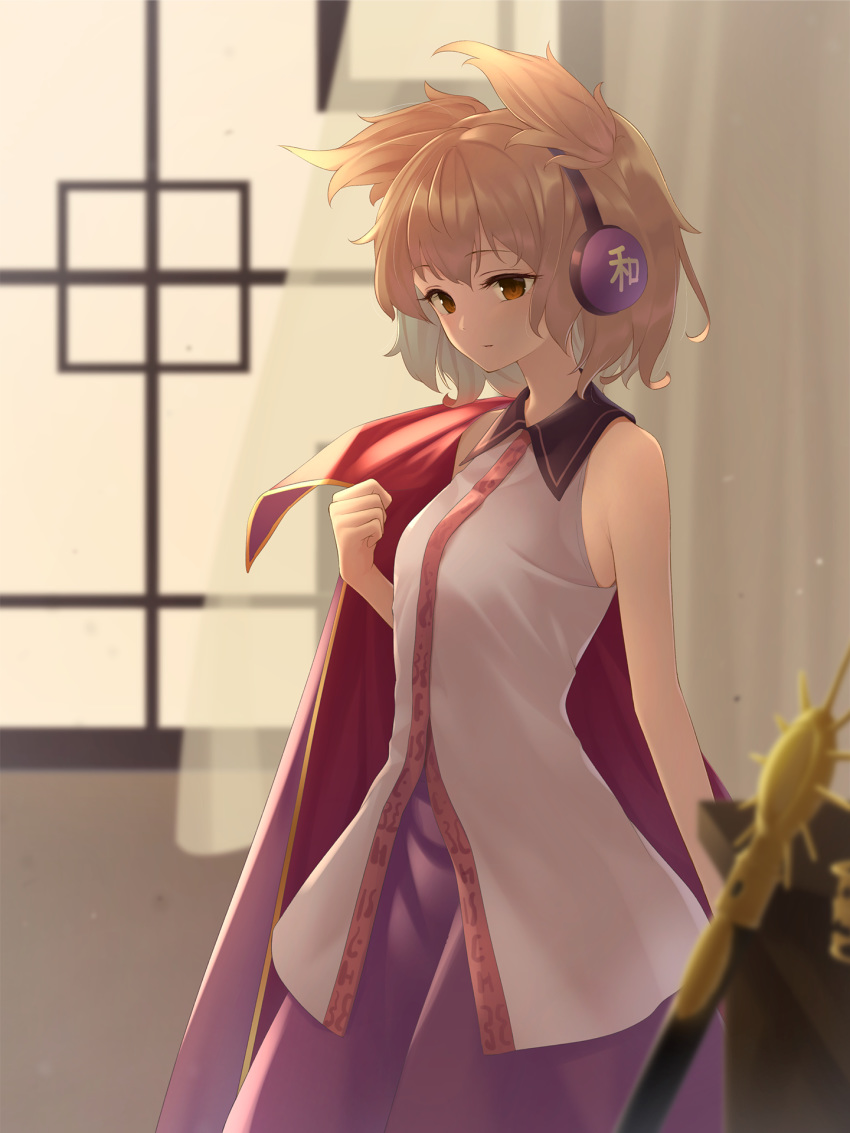 1girl bare_arms blonde_hair blurry blurry_background blurry_foreground brown_eyes cape cowboy_shot curtains earmuffs expressionless highres kanpa_(campagne_9) looking_at_viewer purple_skirt removing_cape shirt short_hair skirt sleeveless sleeveless_shirt solo standing sword touhou toyosatomimi_no_miko weapon window