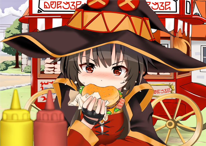 1girl bangs black_cape black_gloves black_hair black_headwear blurry blurry_foreground blush cape commentary_request day depth_of_field dress eyebrows_visible_through_hair fingerless_gloves food gibun_(sozoshu) gloves hamburger hand_up hat highres holding holding_food ketchup_bottle kono_subarashii_sekai_ni_shukufuku_wo! long_hair long_sleeves megumin mustard_bottle nose_blush outdoors red_dress red_eyes sidelocks solo v-shaped_eyebrows vending_cart witch_hat