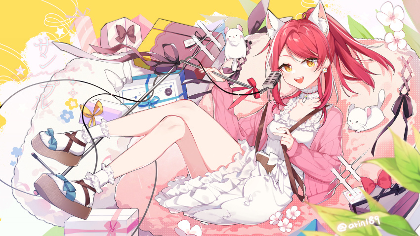 1girl :d alternate_hairstyle animal_ear_fluff animal_ears arin_(fanfan013) bangs blurry box brown_eyes cardigan cat_ears commentary_request creature crossed_legs depth_of_field detached_collar dress earrings flower flower_earrings full_body gift gift_box highres hololive hololive_china jewelry long_sleeves looking_at_viewer microphone mixed-language_commentary open_cardigan open_clothes open_mouth pink_cardigan plant ponytail red_hair sandals sitting smile swept_bangs symbol_commentary twitter_username white_dress white_legwear yogiri_(hololive)