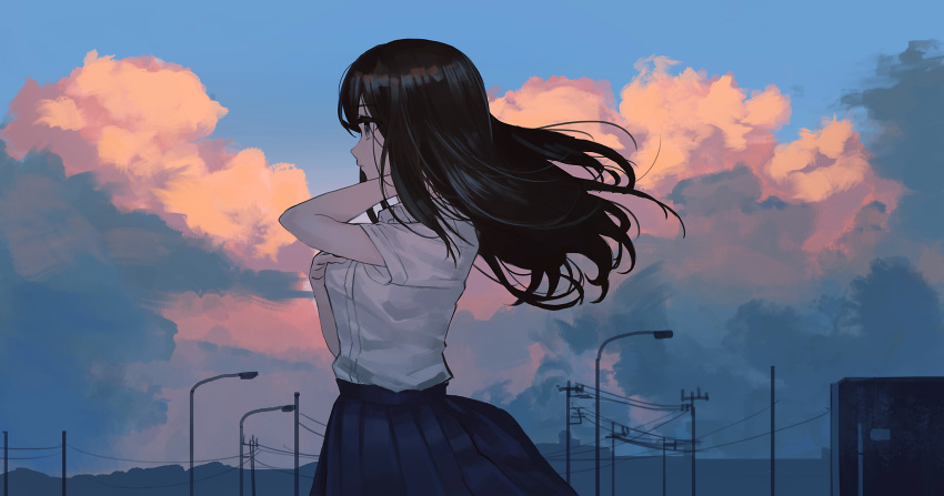 1girl black_hair blue_skirt blue_sky breasts cloud cloudy_sky collared_shirt commentary_request dress_shirt floating_hair hand_on_own_chest hands_up highres lamppost long_hair original outdoors pleated_skirt power_lines ryokucha_manma school_uniform shirt short_sleeves skirt sky small_breasts solo sunset utility_pole white_shirt