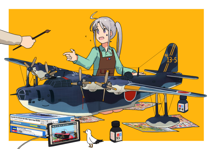 1girl ahoge aircraft airplane akitsushima_(kantai_collection) alternate_color apron bird border brown_apron collared_shirt commentary dress_shirt flying_boat green_shirt h8k holding kantai_collection long_hair long_sleeves model_airplane model_kit newspaper nishikitaitei-chan open_mouth orange_background outside_border paintbrush purple_eyes seagull seaplane shirt side_ponytail sidelocks silver_hair simple_background tablet_pc taigei_(jmsdf) tamiya_incorporated timmyyen white_border