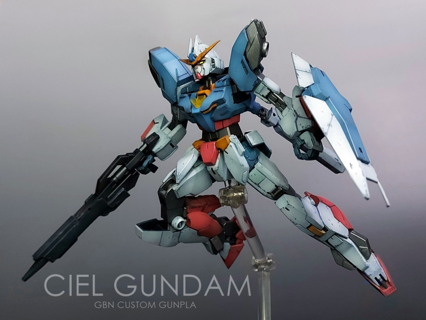 core_gundam_ii gun gundam gundam_build_divers gundam_build_divers_re:rise gunpla highres holding holding_gun holding_weapon looking_up mecha model_kit moki_plamo no_humans original photo_(medium) shield solo v-fin weapon yellow_eyes