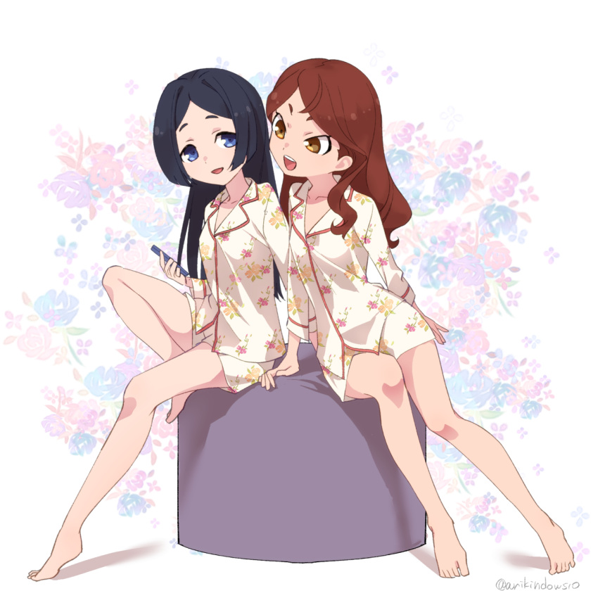 2girls ahoge arikindows10 arm_support barbara_parker bare_legs barefoot black_hair blue_eyes breasts brown_eyes brown_hair collarbone floral_background floral_print hair_down hanna_england highres hime_cut holding holding_phone legs little_witch_academia long_hair long_sleeves looking_at_phone looking_at_viewer multiple_girls nightshirt open_mouth pajamas phone short_eyebrows shorts sidelocks sitting sleepwear small_breasts smile thighs tsurime twitter_username wavy_hair