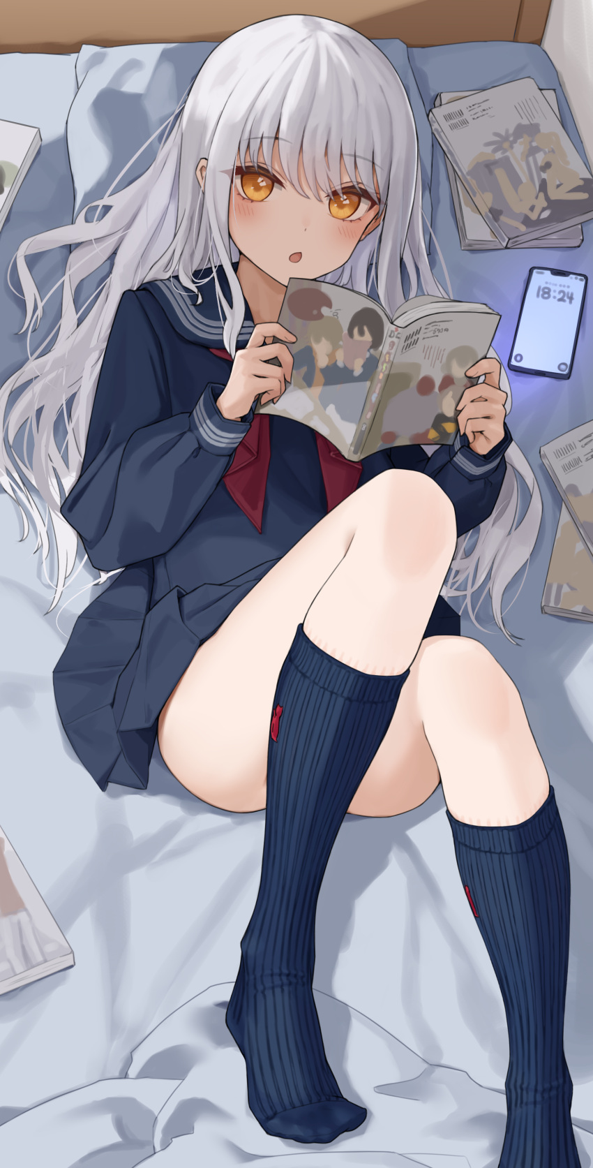 1girl absurdres bed bed_sheet blue_sailor_collar blue_serafuku blue_skirt blue_socks blush cellphone commentary_request grey_hair highres holding holding_manga kopaka_(karda_nui) long_hair long_sleeves looking_at_viewer lying manga_(object) neckerchief on_back on_bed open_mouth original phone pillow red_neckerchief sailor_collar school_uniform serafuku skirt socks solo thighs yellow_eyes