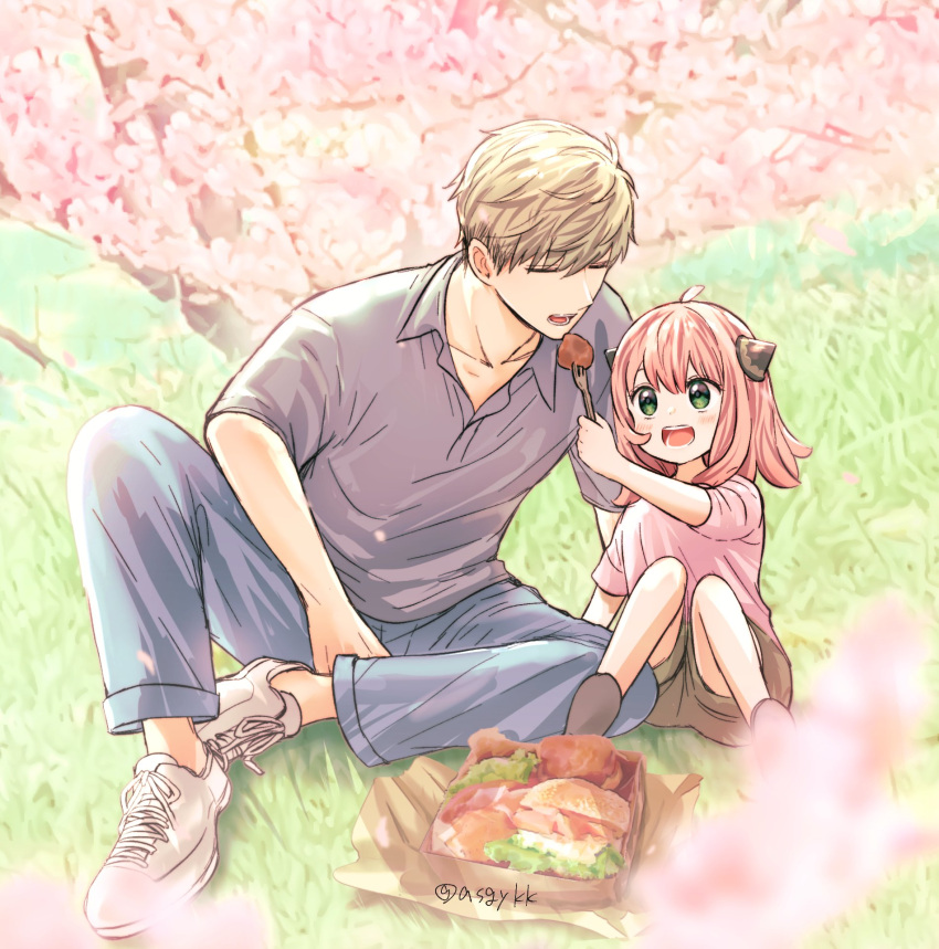 1boy 1girl anya_(spy_x_family) asgykk blonde_hair blue_pants child feeding food fork green_eyes grey_shirt hairpods highres holding holding_fork on_grass open_mouth pants picnic pink_hair sandwich shirt short_hair smile spy_x_family twilight_(spy_x_family)