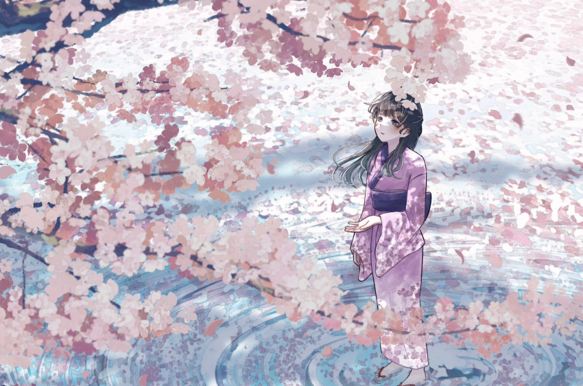 1girl :d arm_at_side black_hair blue_eyes blunt_bangs blush cherry_blossoms day dot_nose falling_petals floral_print half_updo hand_up highres in_water japanese_clothes kimono kumagaya_nono long_hair long_sleeves looking_up obi open_hand open_mouth original outdoors petals pink_kimono print_kimono red_footwear ripples sandals sash sidelocks smile solo standing straight_hair water wide_shot wide_sleeves