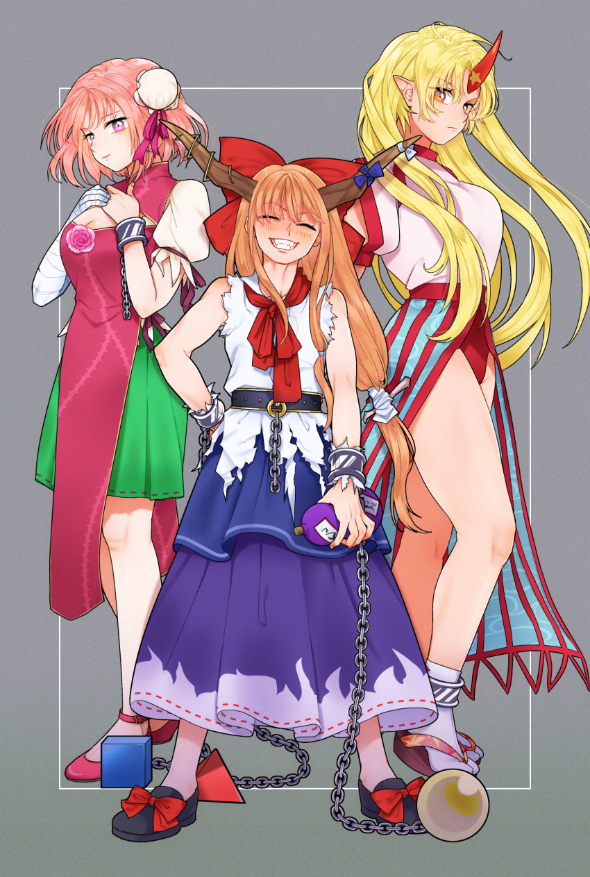 3girls bandaged_arm bandages black_footwear blonde_hair blue_skirt blush bow breasts buruma chain cleavage cleavage_cutout closed_eyes clothing_cutout commentary cube cuffs double_bun expressionless facing_viewer fangs flat_chest flower full_body gourd green_skirt grey_background grin hair_bow hands_on_own_chest head_tilt highres holding horns hoshiguma_yuugi ibaraki_kasen ibuki_suika large_breasts layered_skirt long_hair looking_at_viewer low-tied_long_hair mito_(mo96g) multiple_girls neck_ribbon open_clothes open_skirt orange_hair own_hands_together pink_eyes pink_flower pink_footwear pink_hair pink_rose pleated_skirt pointy_ears puffy_short_sleeves puffy_sleeves purple_eyes pyramid_(geometry) red_eyes red_neckwear ribbon rose sandals shackles sharp_teeth shirt shoe_bow shoes short_hair short_sleeves simple_background single_horn skirt sleeveless sleeveless_shirt smile sphere standing tabard tabi teeth thighs touhou untucked_shirt very_long_hair white_legwear white_shirt