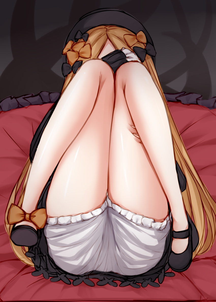 1girl abigail_williams_(fate/grand_order) ass bangs black_bow black_dress black_footwear black_headwear blonde_hair bow covering_face dress fate/grand_order fate_(series) forehead hair_bow hat highres irokari knees_together_feet_apart knees_up legs long_hair lying multiple_bows on_back orange_bow parted_bangs ribbed_dress sleeves_past_fingers sleeves_past_wrists white_bloomers