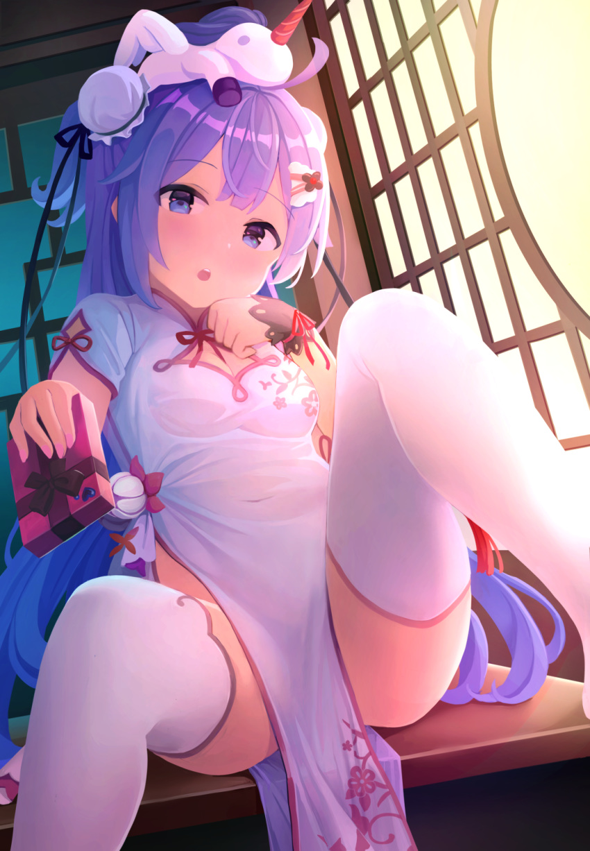 1girl :o azur_lane bangs black_ribbon blush breasts bun_cover china_dress chinese_clothes cleavage cleavage_cutout clothing_cutout covered_navel dress eyebrows_visible_through_hair feet_out_of_frame gift hair_ornament hair_ribbon hairclip highres holding holding_gift knee_up long_hair looking_at_viewer nomio on_table open_mouth pelvic_curtain ponytail purple_eyes purple_hair ribbon short_sleeves sitting small_breasts solo stuffed_winged_unicorn table thighhighs unicorn_(azur_lane) unicorn_(spring's_present)_(azur_lane) very_long_hair white_dress white_legwear wrist_cuffs