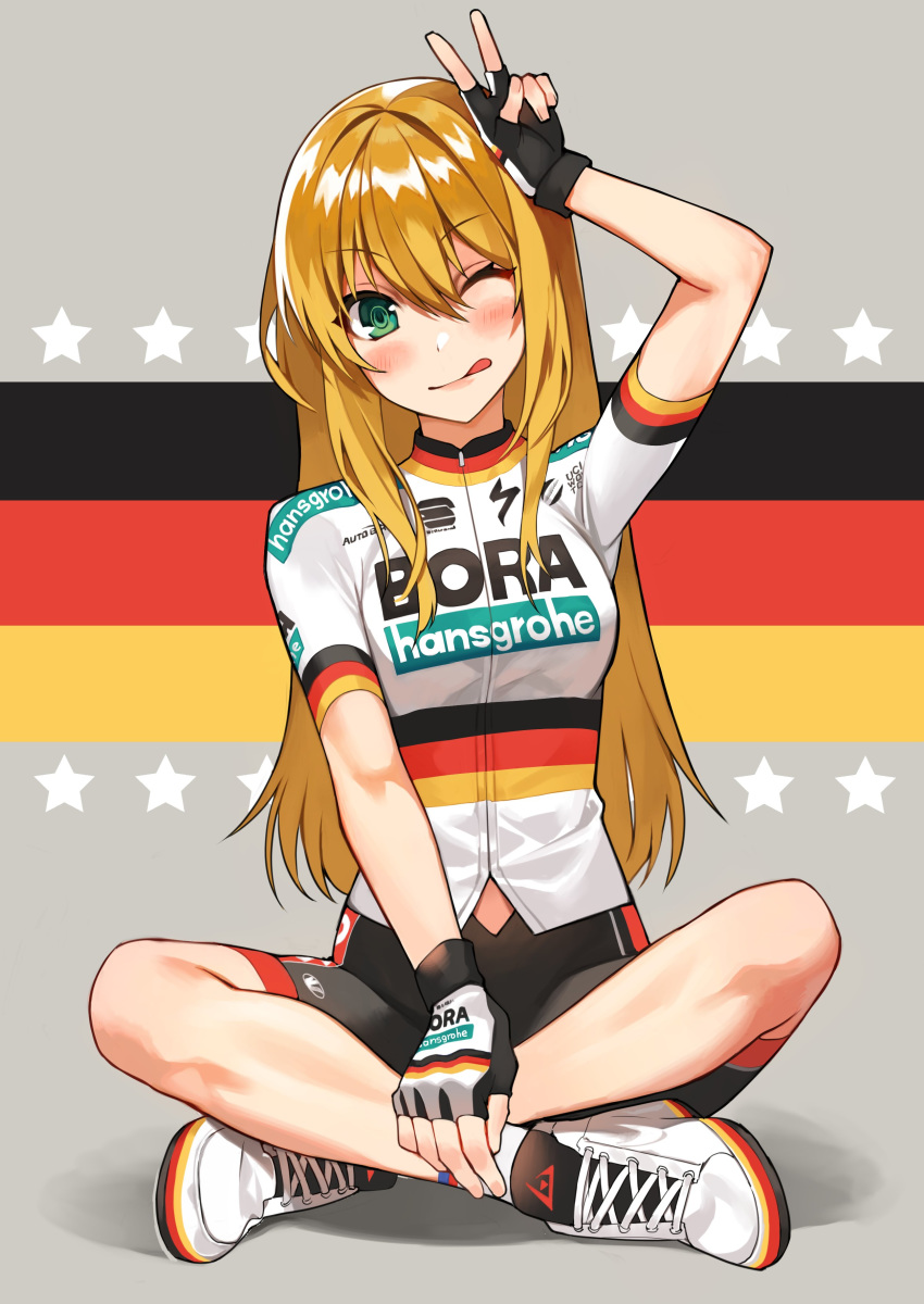 1girl ;q absurdres arm_up bike_jersey bike_shorts black_gloves blonde_hair blush closed_mouth clothes_writing fingerless_gloves flag_background flag_print full_body german_flag gloves green_eyes highres komeo15 looking_at_viewer multicolored multicolored_background one_eye_closed original short_sleeves sitting slit_pupils smile solo sportswear star_(symbol) straight_hair symbol_commentary tongue tongue_out v white_footwear