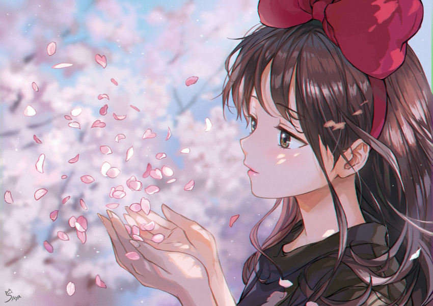 1girl black_dress blue_sky blurry blurry_background bow brown_eyes brown_hair cherry_blossoms closed_mouth dress flower hair_bow hands_together kiki long_hair majo_no_takkyuubin petals red_bow saya_(mychristian2) signature sky solo tree