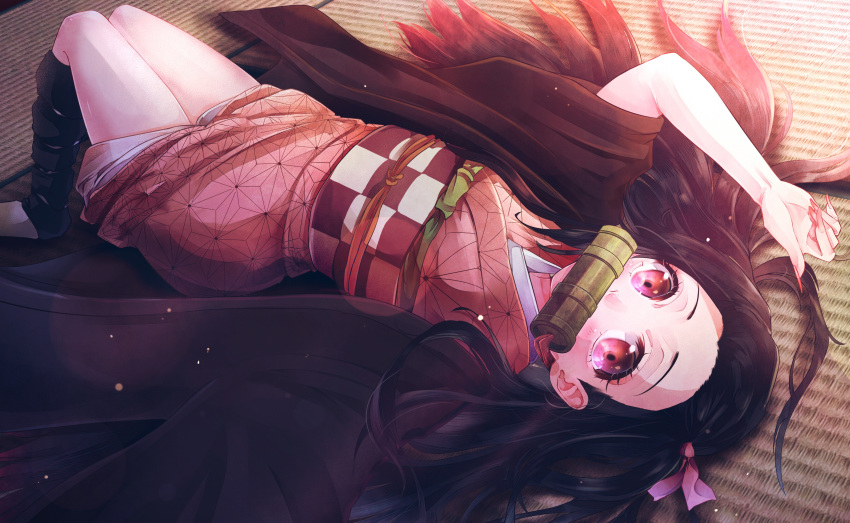 1girl absurdres bit_gag black_hair fingernails full_body gag hair_ribbon highres japanese_clothes kamado_nezuko kimetsu_no_yaiba kimono long_hair looking_at_viewer lying obi on_back pink_kimono pink_ribbon print_kimono red_eyes red_nails ribbon sash sharp_fingernails short_kimono solo very_long_hair yurari_yuhira