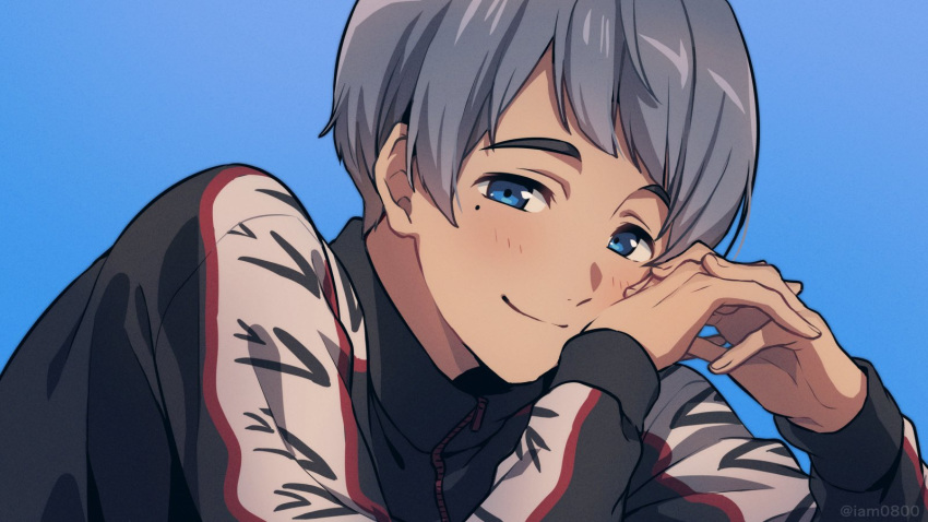 1boy bangs black_jacket blue_background blue_eyes blush bowl_cut closed_mouth commentary free! grey_hair hands_clasped highres jacket long_sleeves male_focus mole mole_under_eye nitori_aiichirou own_hands_together sayshownen short_hair simple_background smile solo track_jacket twitter_username upper_body watermark zipper zipper_pull_tab