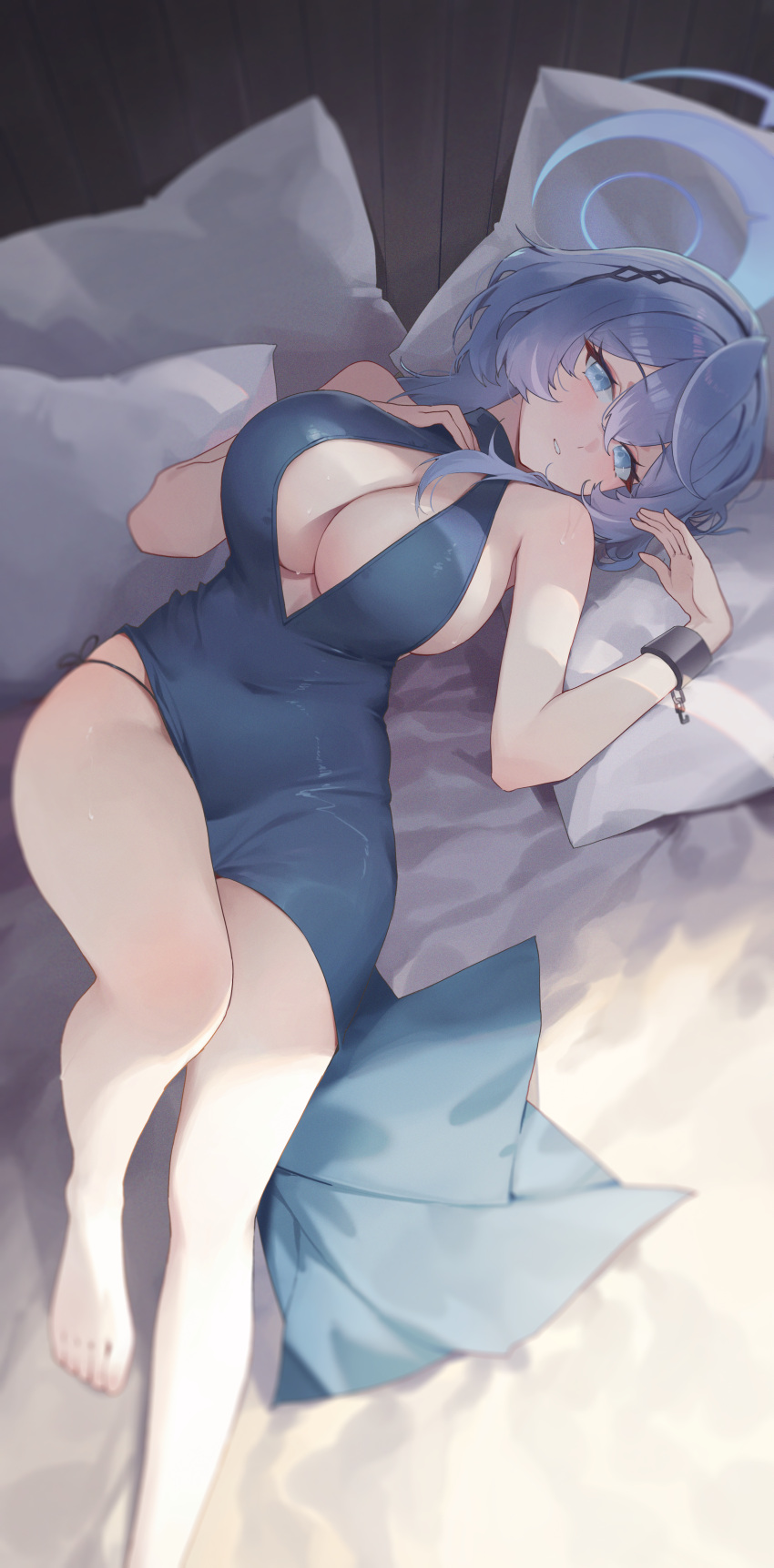 1girl absurdres ako_(blue_archive) ako_(dress)_(blue_archive) bare_legs barefoot black_hairband blue_archive blue_dress blue_eyes blue_hair blue_halo blush breasts cuffs dress foot_out_of_frame gmirror1 hair_between_eyes hairband halo handcuffs highres large_breasts legs long_hair looking_at_viewer official_alternate_costume open_mouth pillow sideboob sleeveless sleeveless_dress solo toes