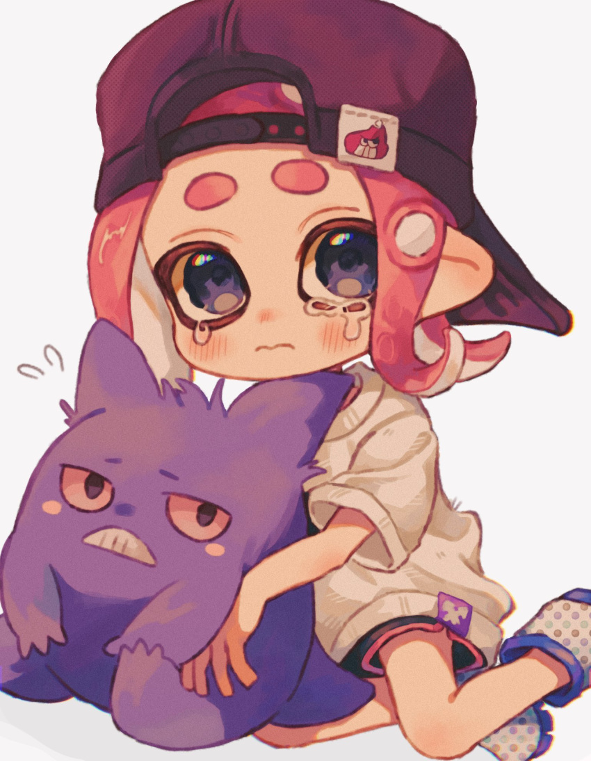 1girl backwards_hat baseball_cap black_eyes black_headwear blue_eyes closed_mouth colored_sclera colored_skin commentary_request gengar hat highres looking_at_viewer medium_hair ochocho2828 octoling octoling_girl octoling_player_character pink_hair pokemon pokemon_(creature) purple_skin red_sclera simple_background sitting splatoon_(series) tears teeth tentacle_hair thick_eyebrows wavy_mouth white_background