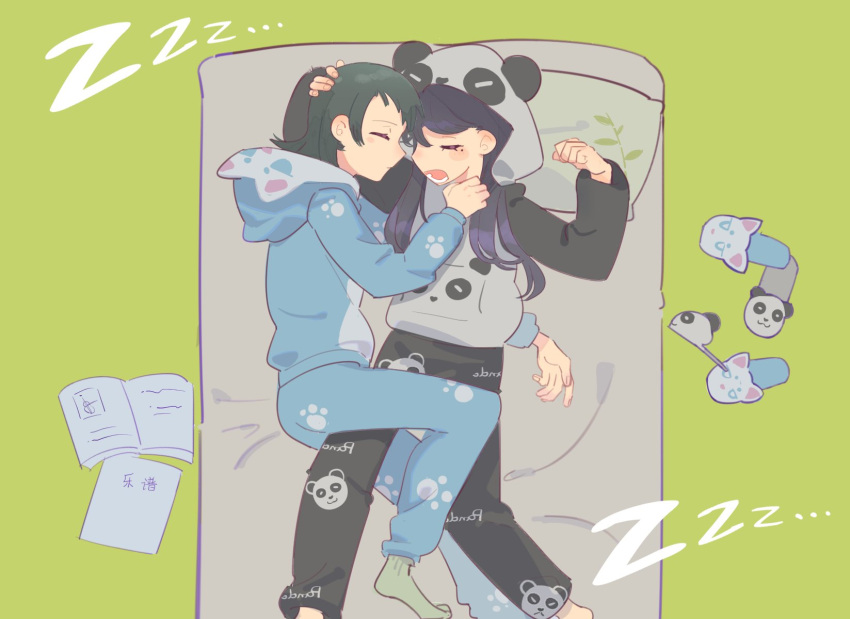 2girls animal_hood animal_print bang_dream! bang_dream!_it's_mygo!!!!! bear_print black_hair blue_hoodie blue_pants book closed_eyes closed_mouth commentary cuddling from_above green_background green_socks hand_on_another's_chest hand_on_another's_head highres hood hoodie long_hair lying mole mole_under_eye multiple_girls on_back on_bed on_side open_mouth panda_hood panda_print pants purple_eyes shiina_taki simple_background sleeping slippers socks takechi63 yahata_umiri yuri zzz