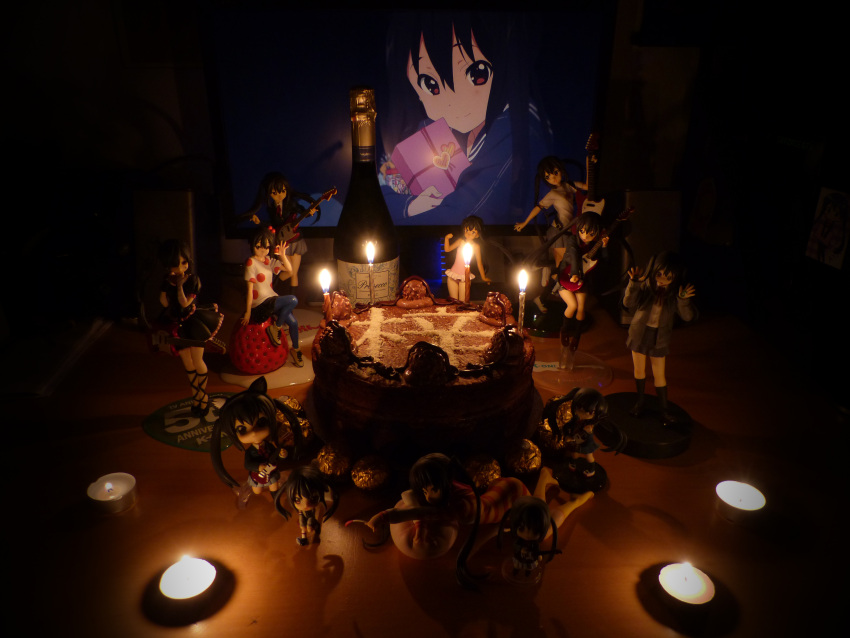 1girl 2d_dating absurdres alcohol birthday birthday_cake black_hair brown_eyes cake candle champagne chocolate figure food gift highres k-on! md5_mismatch monitor nakano_azusa photo_(medium) resolution_mismatch source_smaller twintails