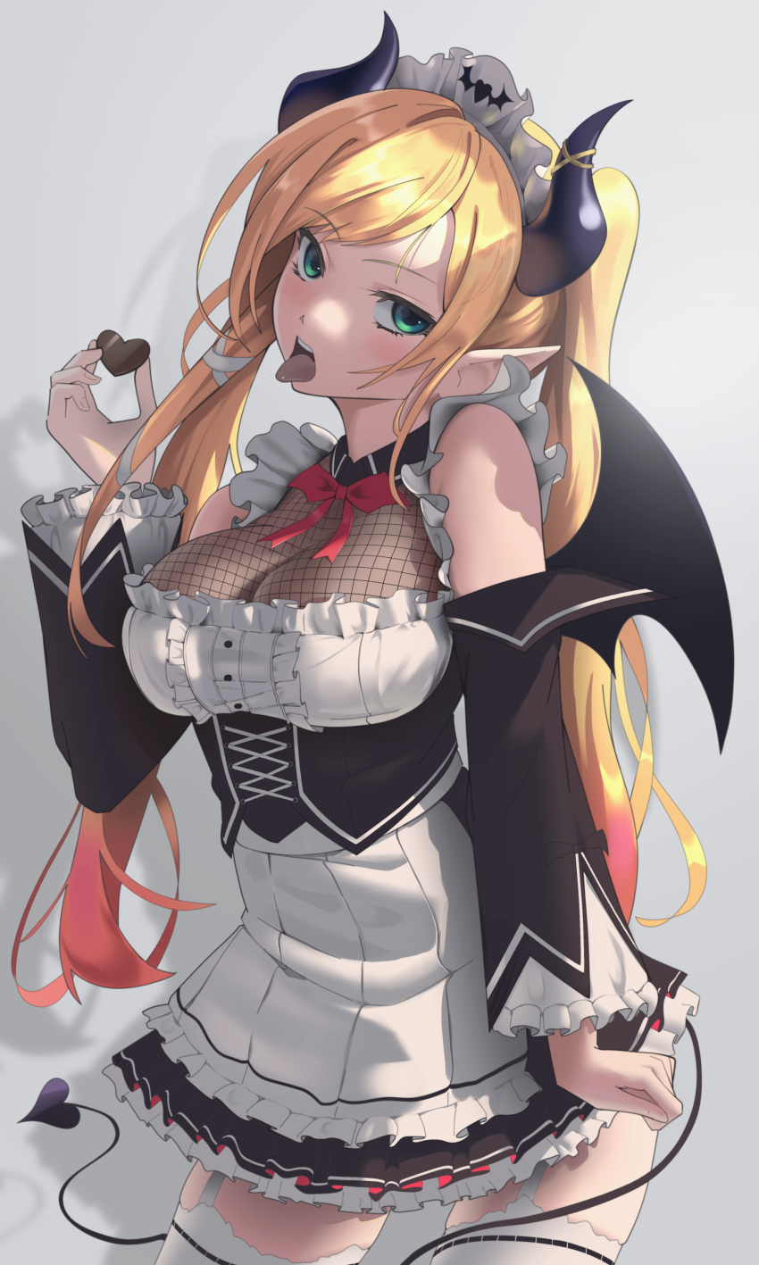 1girl absurdres apron aqua_eyes black_dress blonde_hair breasts candy chocolate chocolate_heart cleavage clenched_hand demon_girl demon_horns demon_tail dress fishnet_top fishnets food frilled_dress frills grey_background head_tilt heart highres holding holding_chocolate holding_food hololive horns large_breasts long_hair looking_at_viewer maid maid_apron maid_headdress mechjunk open_mouth pink_hair pointy_ears solo tail thighhighs tongue tongue_out twintails virtual_youtuber yuzuki_choco