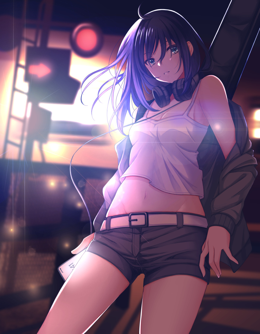 1girl ahoge bangs bare_shoulders black_hair black_jacket black_shorts blue_eyes blurry blurry_background breasts cable camisole cellphone cleavage collarbone commentary cowboy_shot crop_top eyebrows_visible_through_hair groin hair_between_eyes headphones headphones_around_neck highres holding holding_phone instrument_case instrument_on_back jacket long_hair looking_at_viewer medium_breasts midriff navel niba_iru!? night off_shoulder open_clothes open_jacket original outdoors parted_lips phone short_shorts shorts sidelocks smartphone solo standing traffic_light white_camisole