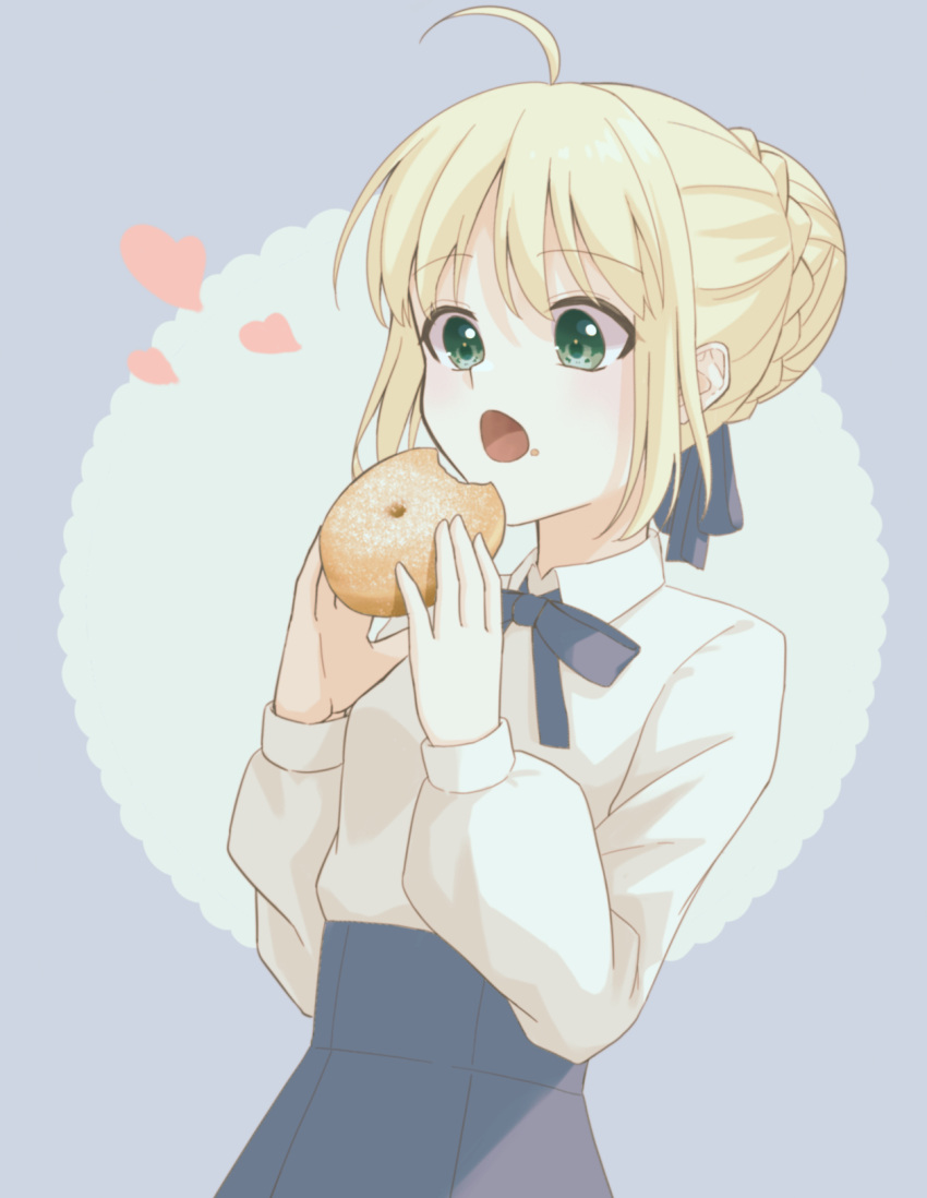 1girl ahoge artoria_pendragon_(all) bangs blonde_hair blue_ribbon blue_skirt braid braided_bun commentary_request doughnut eating eyebrows_visible_through_hair fate/stay_night fate_(series) food food_on_face green_eyes hair_ribbon heart high-waist_skirt highres holding holding_food long_sleeves looking_at_food neck_ribbon open_mouth ribbon saber shirt short_hair simple_background skirt solo standing two-tone_background white_shirt yumikan
