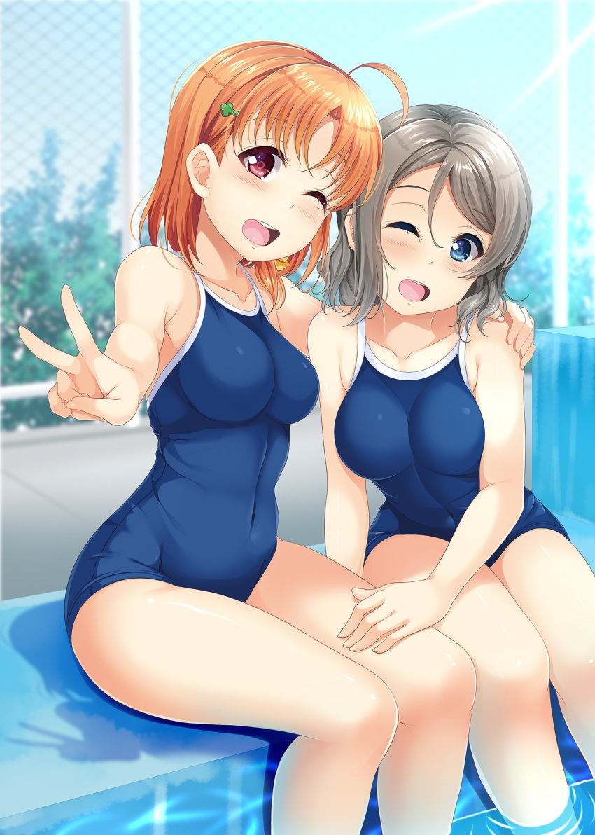 2girls ahoge blue_eyes blue_swimsuit blurry chain-link_fence clover_hair_ornament competition_school_swimsuit cowboy_shot depth_of_field fence grey_hair hair_ornament highres hino_minato_(spec.c) love_live! love_live!_sunshine!! multiple_girls one_eye_closed orange_hair poolside red_eyes school_swimsuit short_hair sitting ssoaking_feet swimsuit takami_chika v watanabe_you water