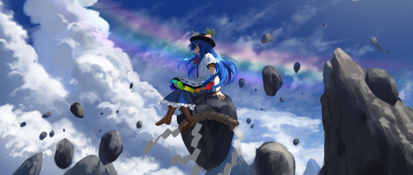 1girl bangs black_headwear blue_hair blue_skirt blue_sky boots bow bowtie brown_footwear closed_mouth cloud commentary cross-laced_footwear floating_rock food frills fruit full_body hat highres hinanawi_tenshi leaf long_hair looking_to_the_side outdoors peach puffy_short_sleeves puffy_sleeves rainbow rainbow_gradient rainbow_order red_bow red_eyes rock shirt short_sleeves skirt sky solo standing suna_(s73d) touhou white_shirt