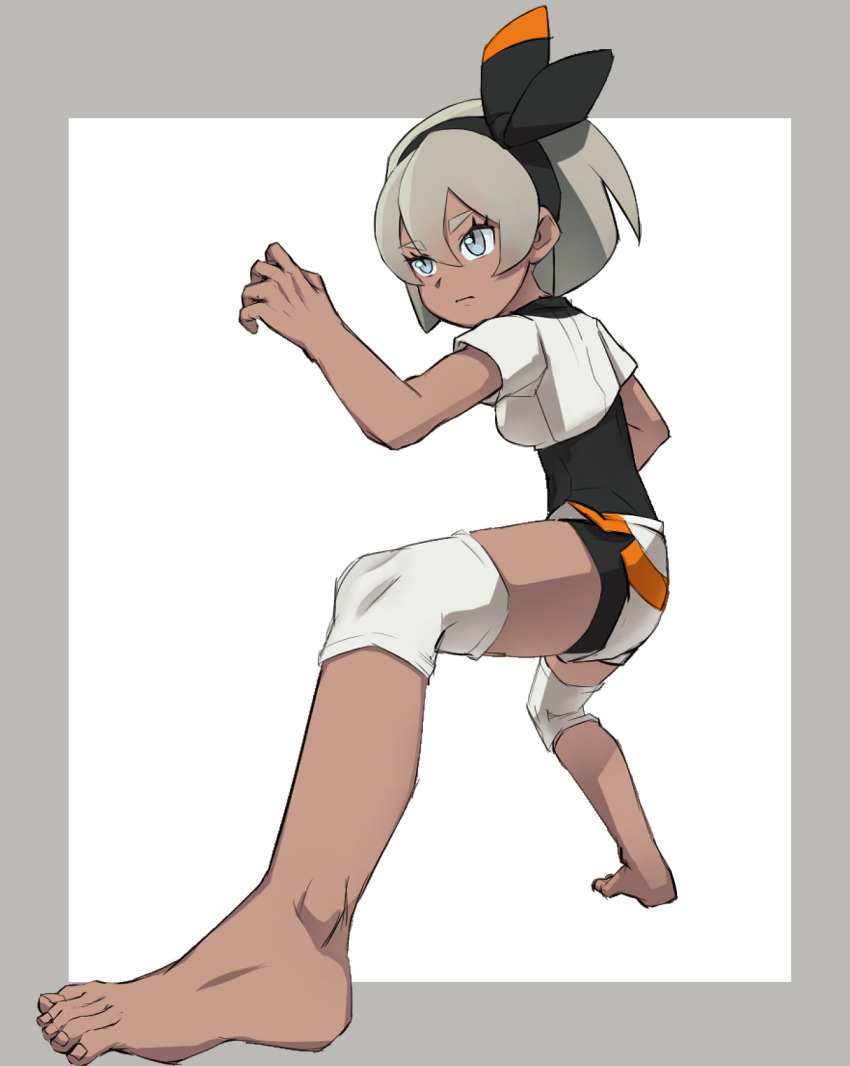 1girl barefoot bea_(pokemon) black_bodysuit black_hairband blue_eyes bodysuit bodysuit_under_clothes bow_hairband dark_skin dark_skinned_female dolphin_shorts fighting_stance full_body grey_hair gym_leader hairband highres legband nyonn24 perspective pokemon pokemon_(game) pokemon_swsh short_shorts shorts solo