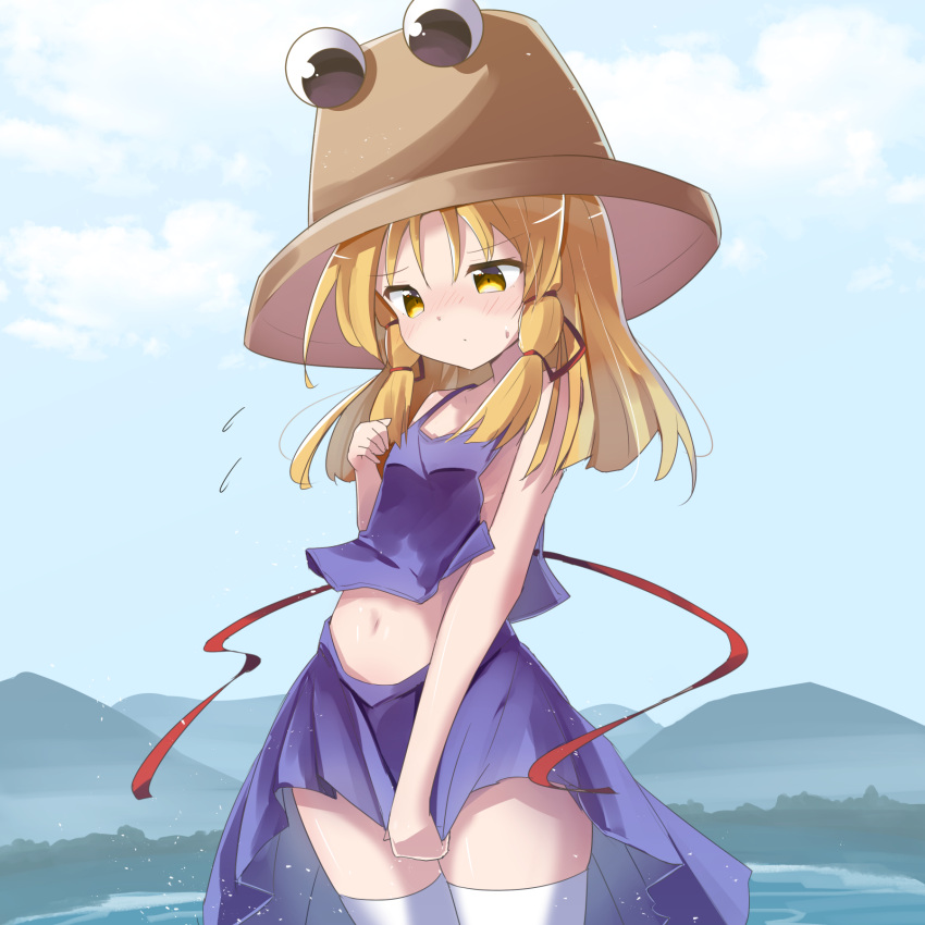 1girl bangs blonde_hair blue_sky blush brown_headwear camisole closed_mouth cloud commentary_request day eyebrows_visible_through_hair flying_sweatdrops hair_between_eyes hair_ribbon hand_up hat highres long_hair moriya_suwako mountain nose_blush outdoors pleated_skirt purple_camisole purple_skirt red_ribbon ribbon ryogo skirt sky solo sweat thighhighs touhou water white_legwear yellow_eyes